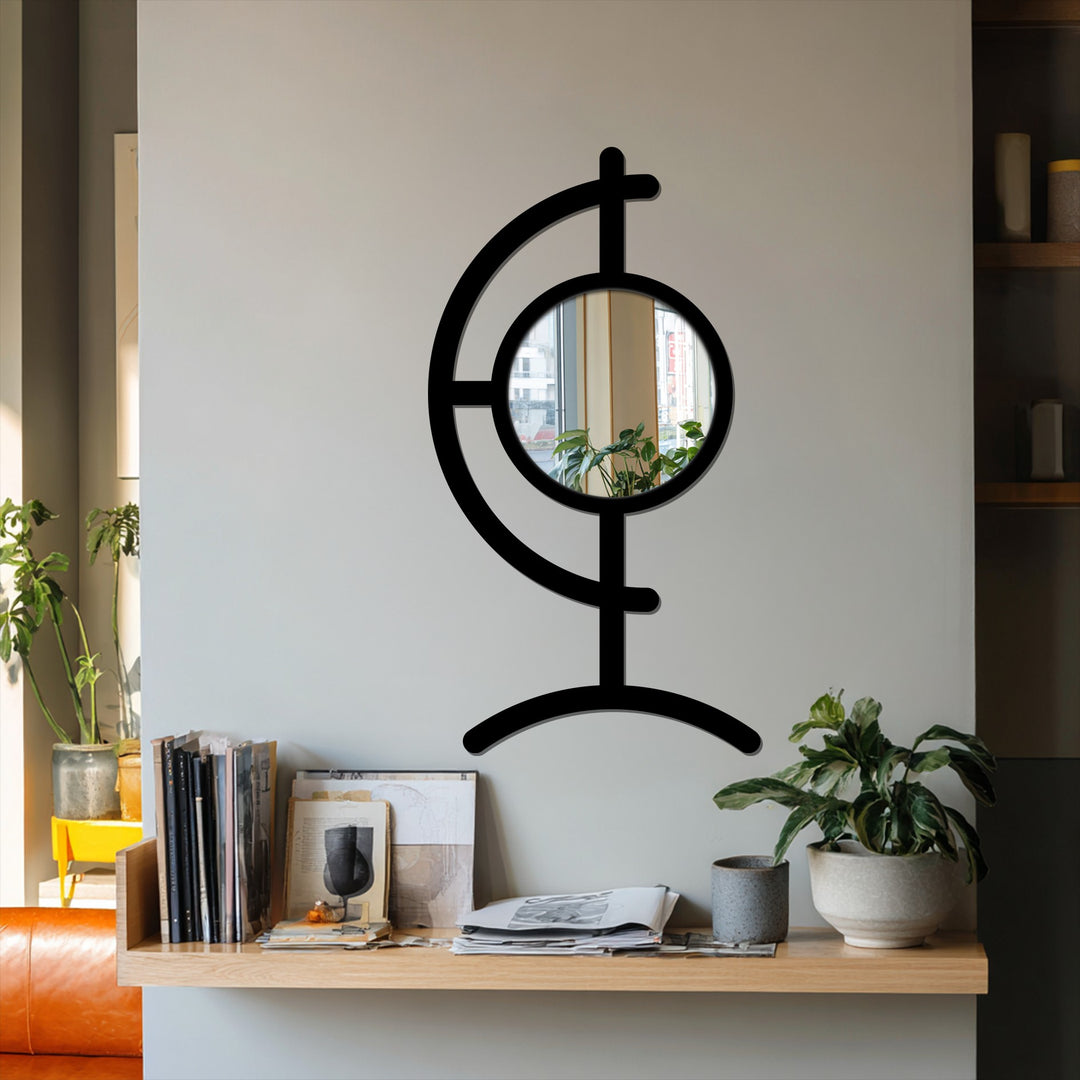Highlighting the abstract quality, this sculptural Orbit Line floor mirror features a round framed wall mirror set within a dynamic black metal wall decor design.