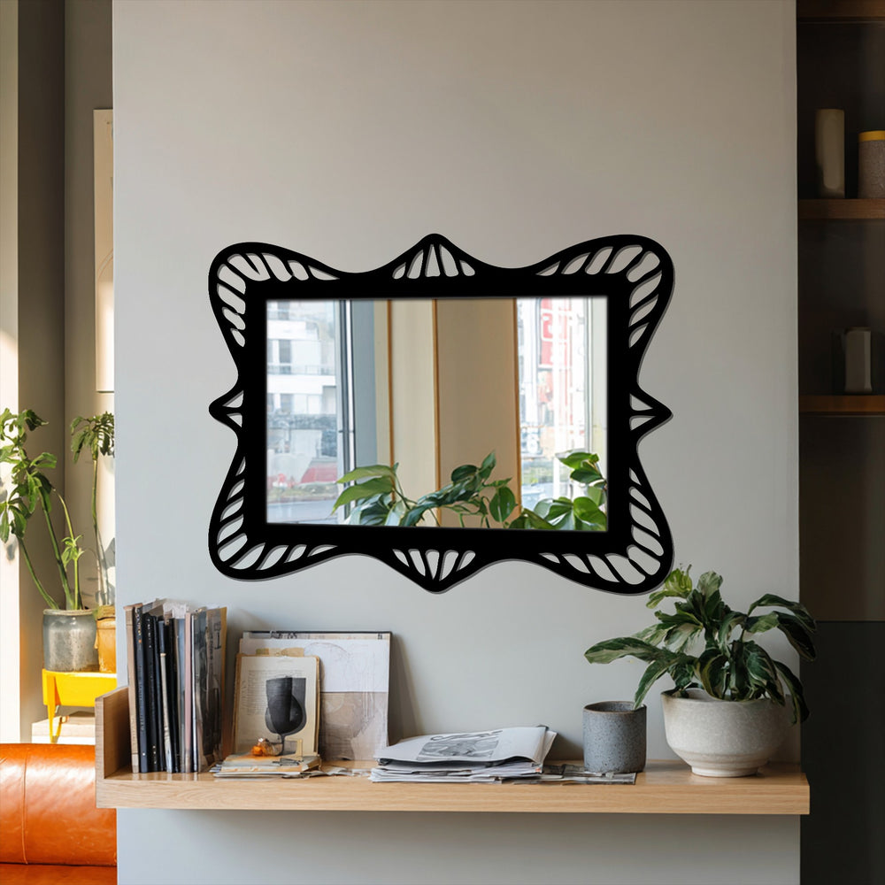 Showcasing the layering effect of this ornate wave frame metal wall art mirror, its sculpted black frame offers a unique metal wall art look.