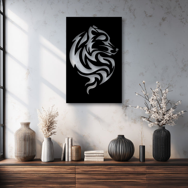 The darkest area highlights a striking black background for the tribal wolf swirl metal art for wall, showcasing its abstract animal design.