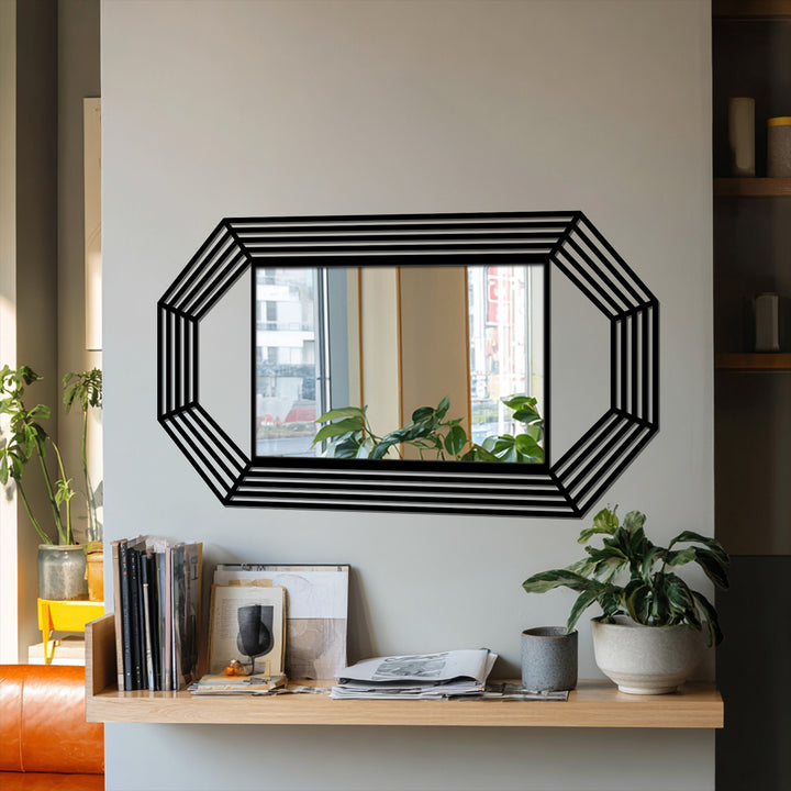 High color contrast accentuates the black metal of the octagonal frame on this modern floor mirror, contrasting against the neutral wall, creating decorative metal art.