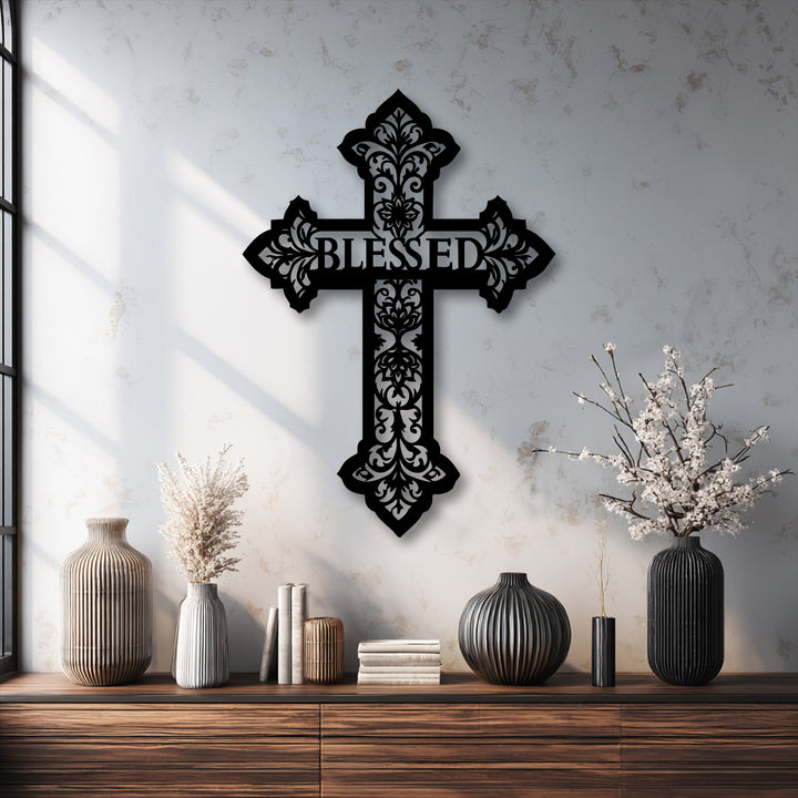 Subtle color transitions from warm cream to cool gray on the textured wall beautifully frame the black Blessed Cross decorative metal art.