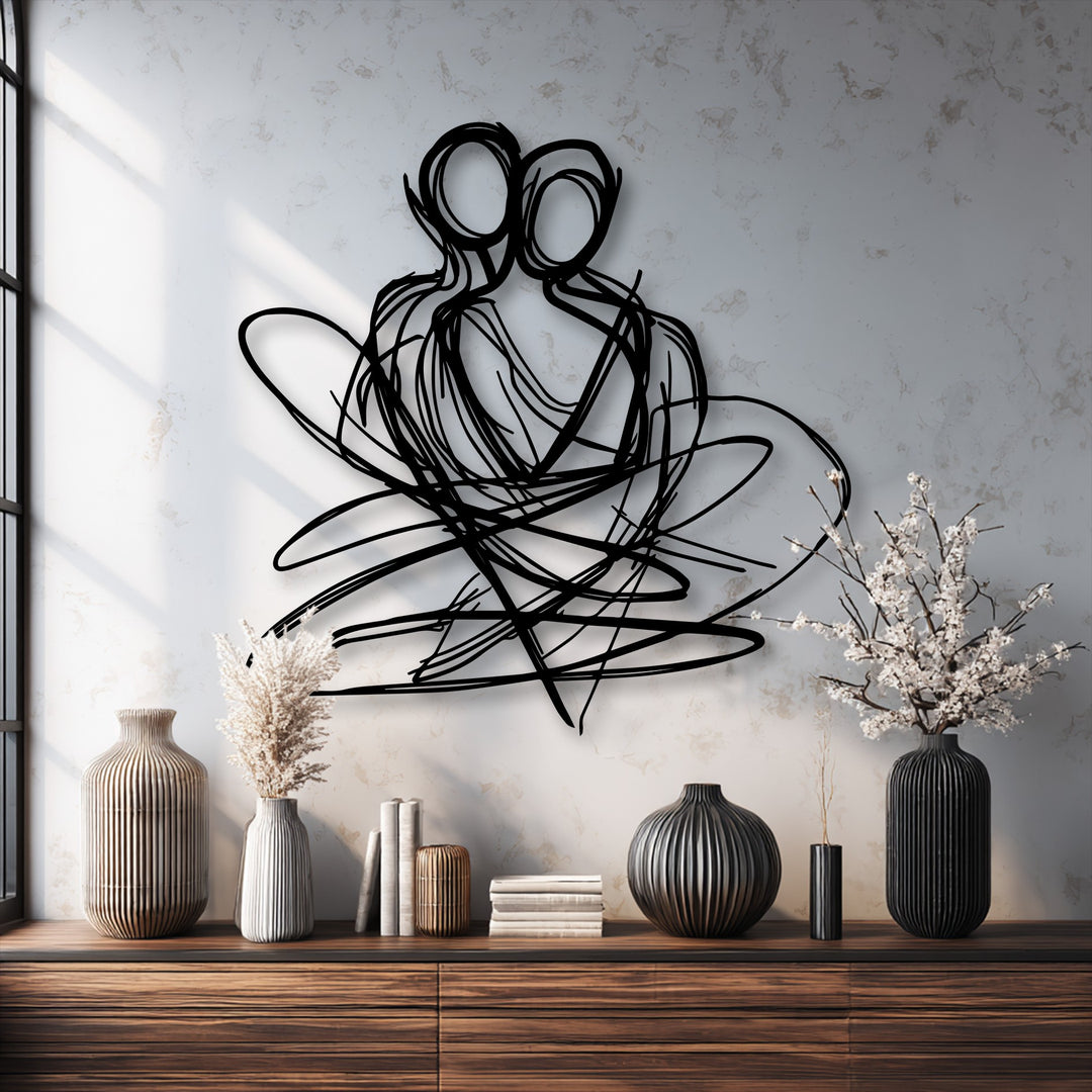 Subtly textured white wall with a distressed finish highlights the sleek black abstract couple metal art for wall, enhancing modern elegance.