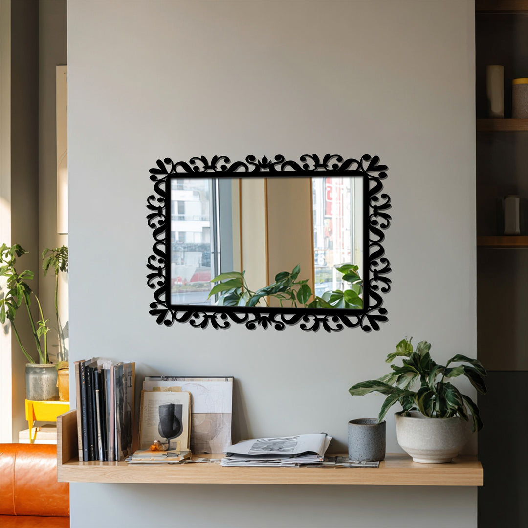 The stillness reflected in this rectangular decorative mirror showcases the beauty of the surrounding plants and the delicate vine scroll frame.