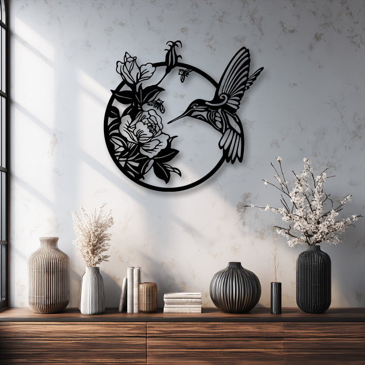 The elegant and serene mood of the room is enhanced by the graceful hummingbird and blooming flowers metal art for wall.