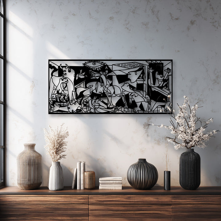 The striking color transition from the dark, Guernica-inspired unique metal wall art panel against the softly textured, cream-hued wall.