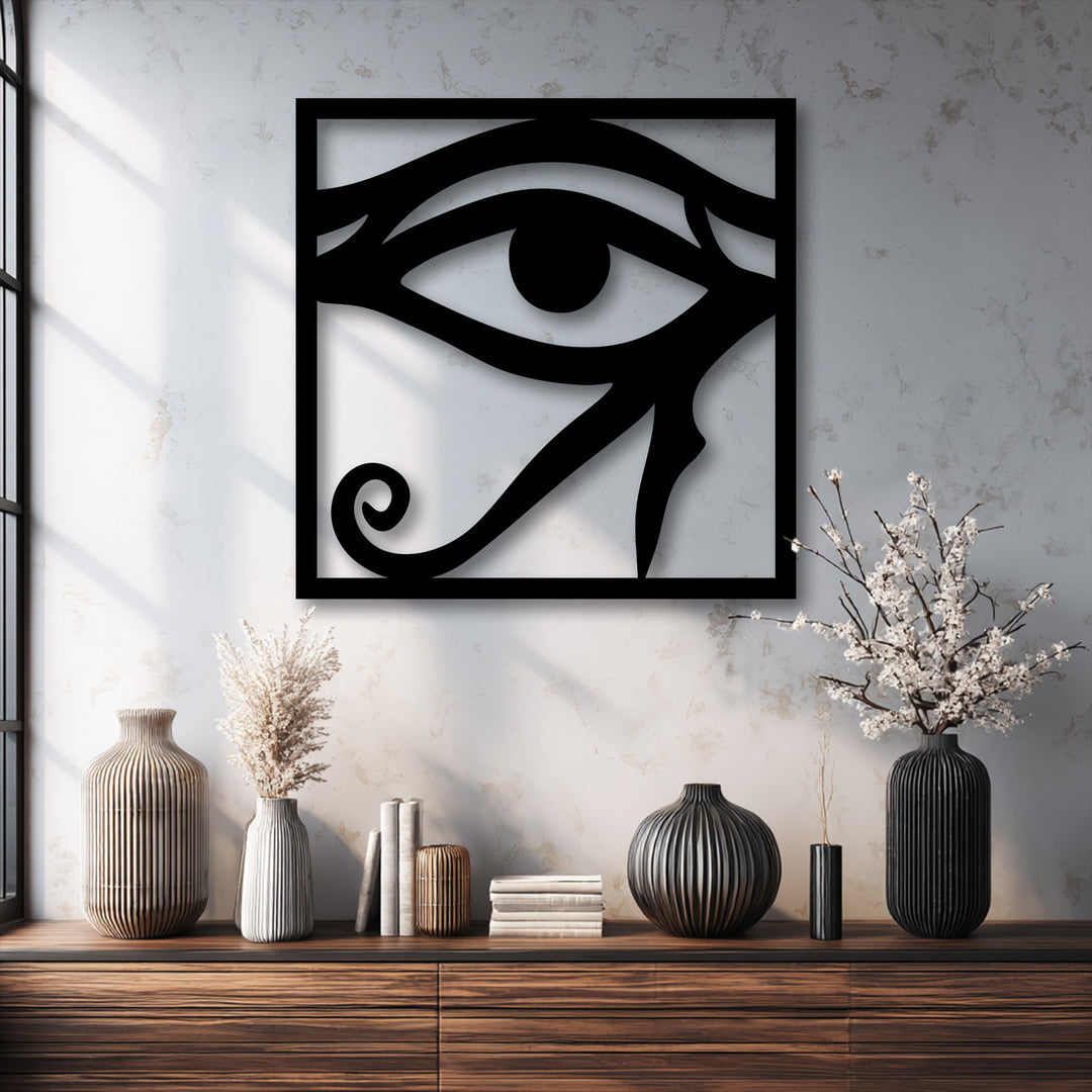 The striking negative space defines this Eye of Horus metal artwork, forming the iconic ancient Egyptian symbol with shadow play.