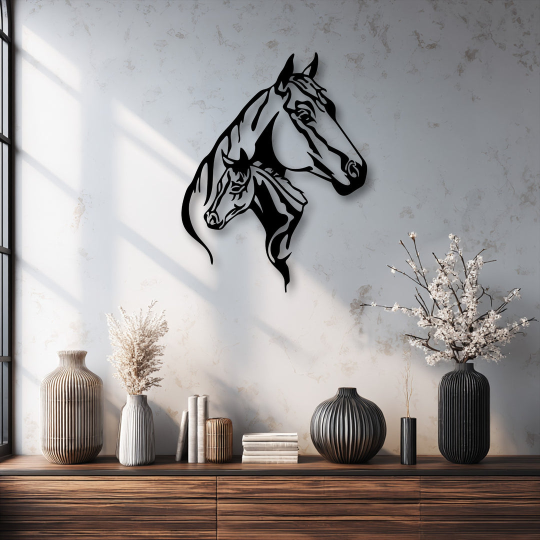 The elegant flowing lines of this unique metal wall art create a powerful sense of movement in the dual horse head silhouette.