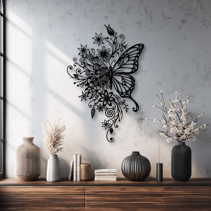 The visual rhythm of the black floral butterfly decorative metal art dynamically sweeps, complementing fluted vases for elegant nature-inspired decor.