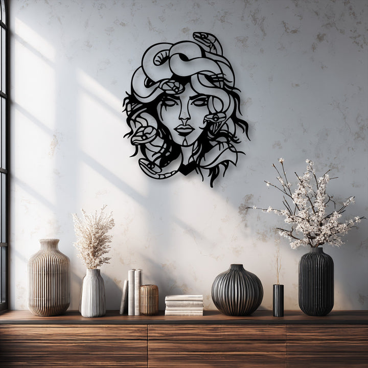 Dramatic light and shadow define the powerful Medusa metal art for wall, showcasing the snake goddess decor with striking contrast.