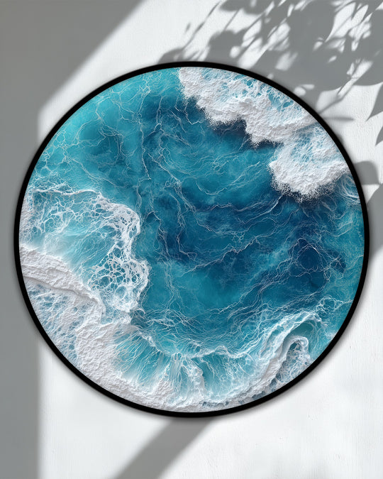 Layers of turquoise shades in this ocean wave aerial round canvas print create a captivating depth, showcasing the beauty of canvas wall decor with coastal flair.
