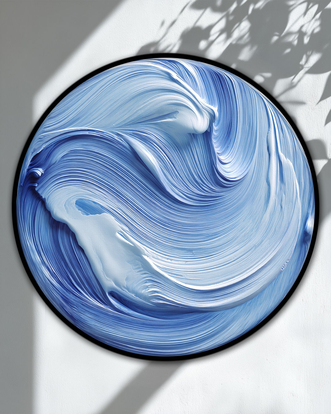 Cool color temperature illuminates the ocean flow blue abstract round canvas print, a captivating example of hanging canvas art depicting modern wave movement.