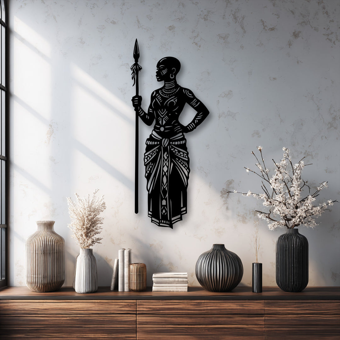 White negative space dramatically outlines the powerful Tribal African Warrior with Spear metal art for wall, mounted on a textured wall.