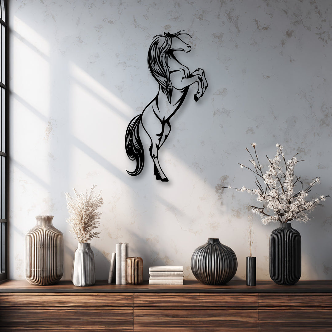 The negative space of the bright, textured wall starkly defines the dramatic rearing horse unique metal wall art silhouette.
