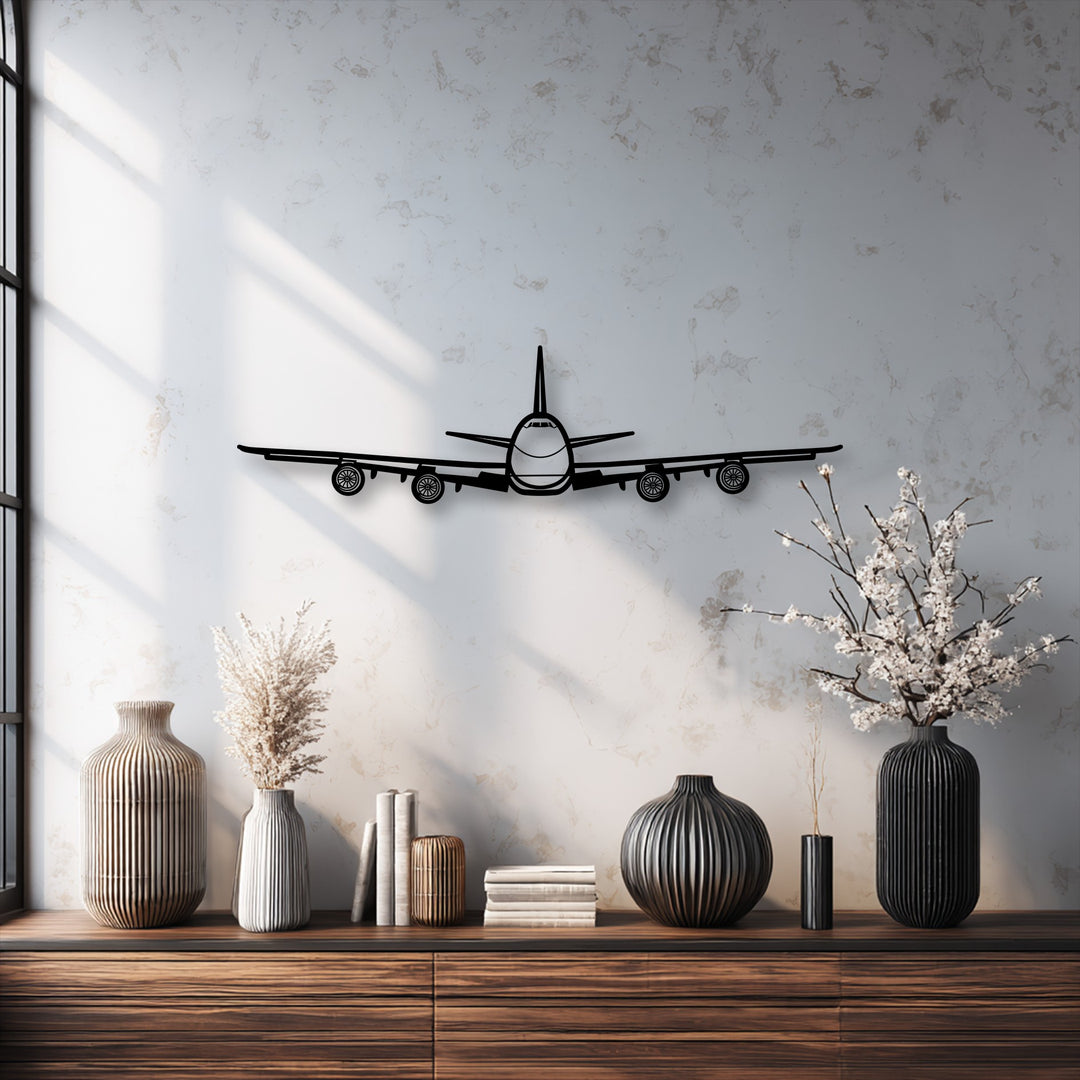 The image's soft, slightly warm color temperature beautifully complements the sleek airplane front view metal artwork, enhancing the aviation decor.