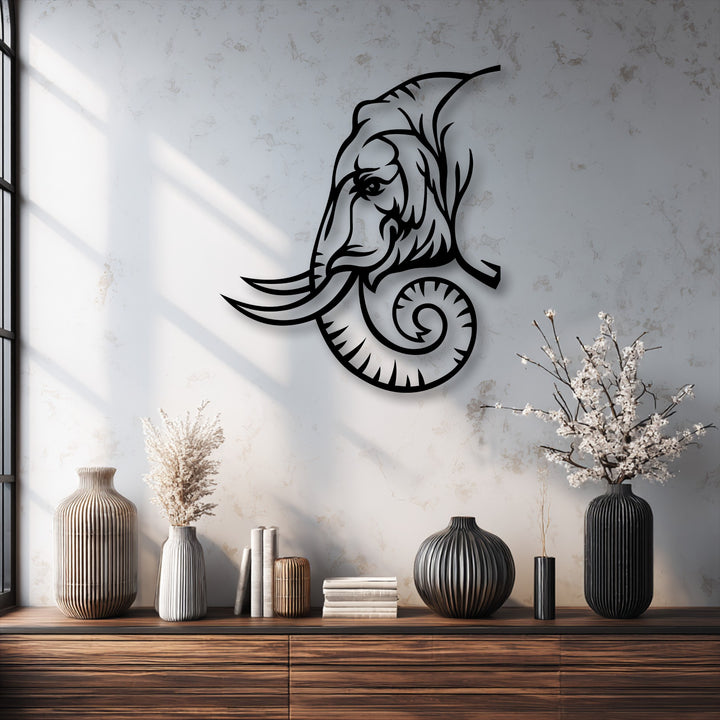 Delicate white blossoms in a dark fluted vase beautifully contrast the bold lines of the majestic elephant line art decorative metal art.