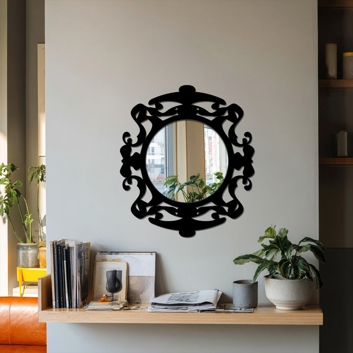 Showcasing the abstract quality of this ornate round floor mirror's dark frame, a striking example of innovative decorating with wall mirrors, adds a touch of mystery.