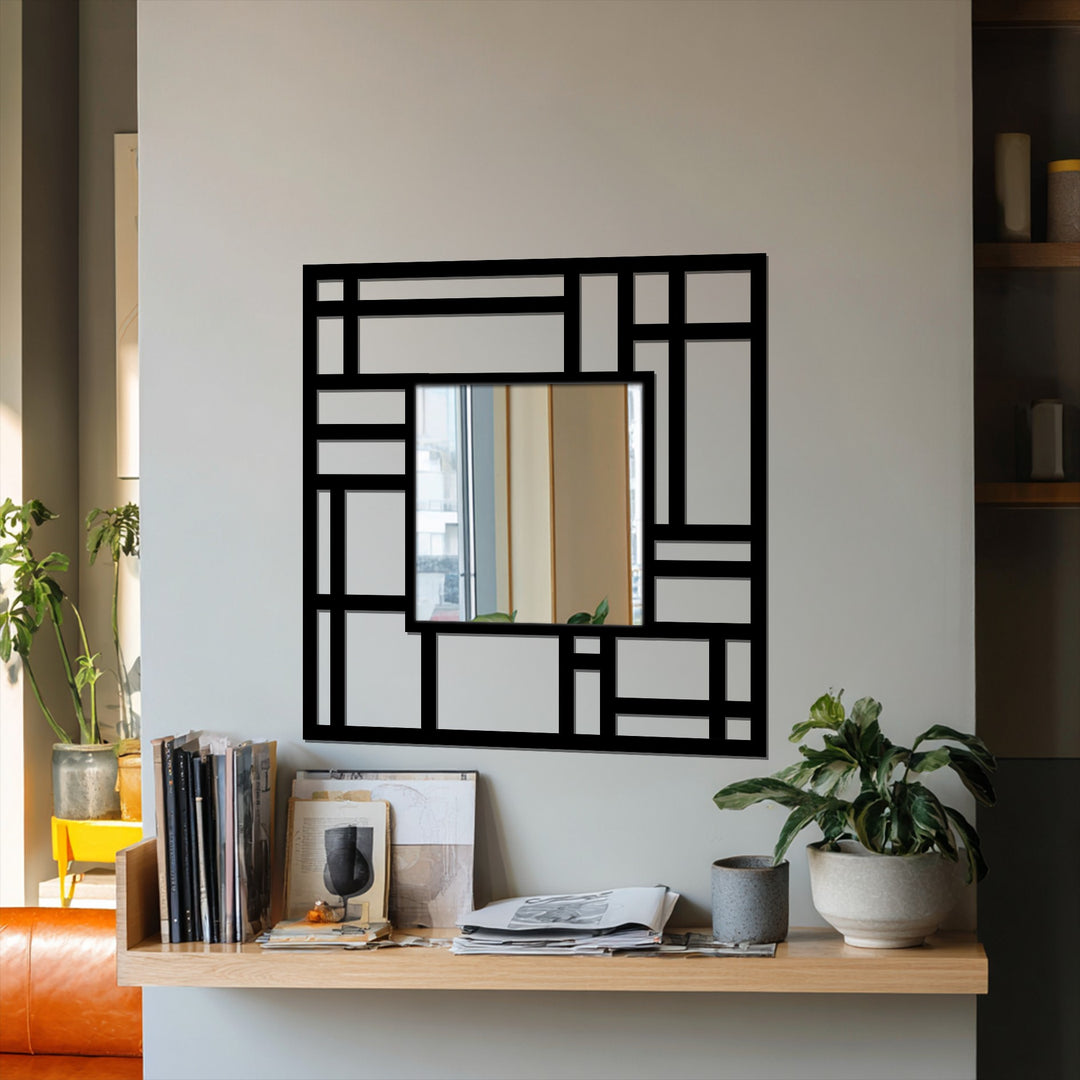Neutral wall paint and a wooden shelf accentuate the Structured Grid modern geometric metal wall mirror, enhancing its appearance as a striking piece of metal wall decor.