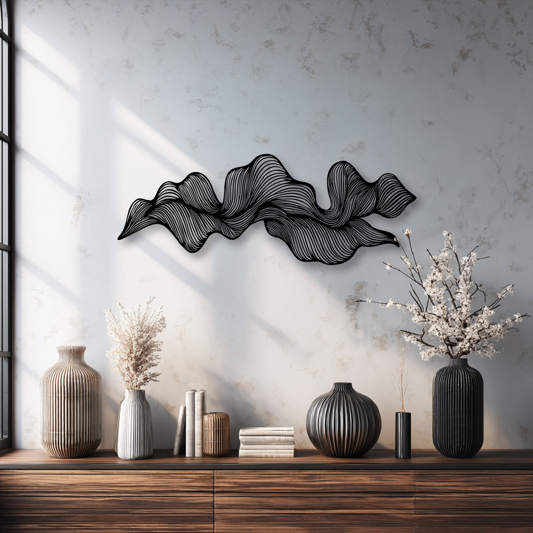 Delicate white cherry blossoms beautifully complement the flowing lines of the abstract wave metal decoration wall art, creating a serene modern ambiance.