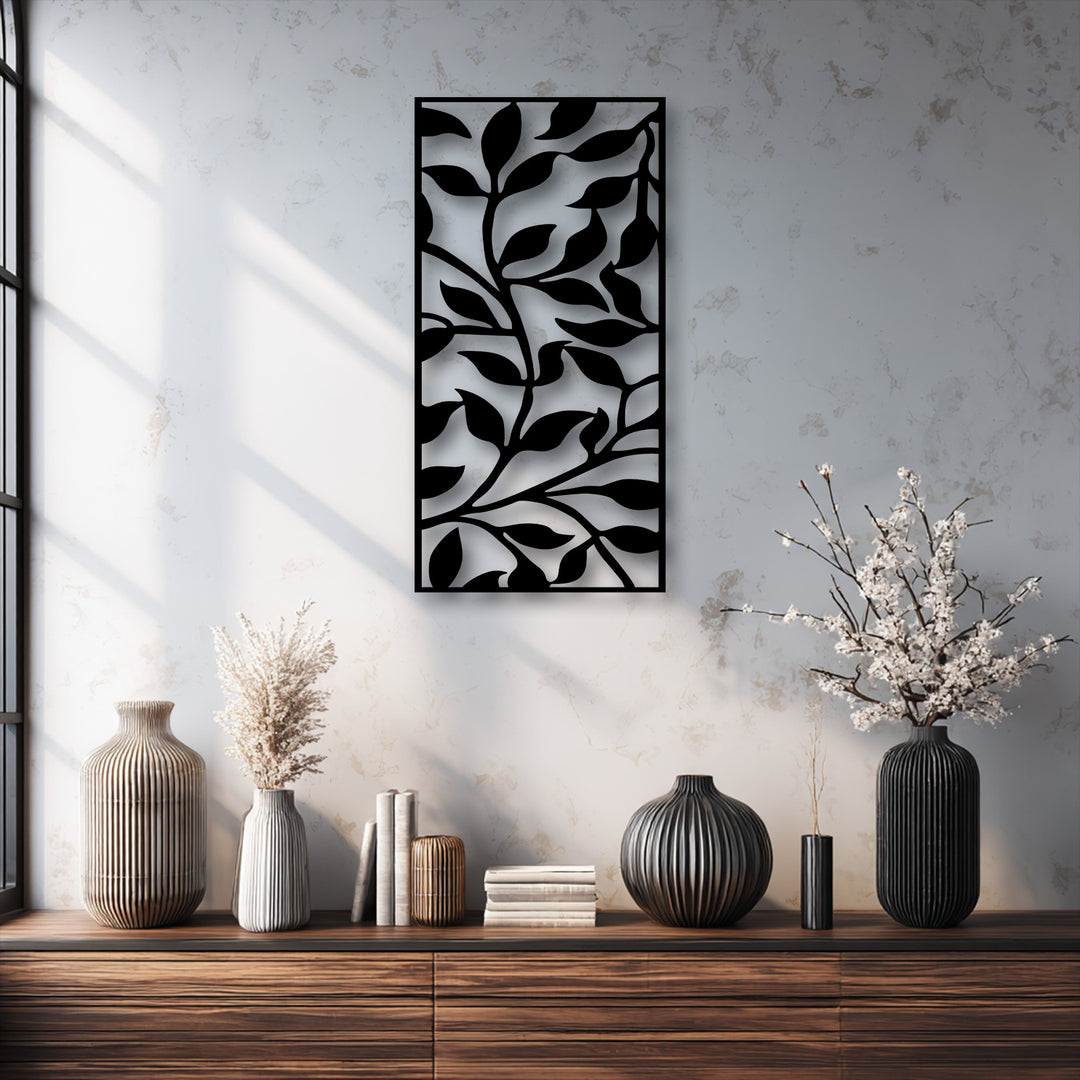 The matte black finish of the abstract leaf branch pattern metal wall decor adds a sleek, modern botanical touch to the space.