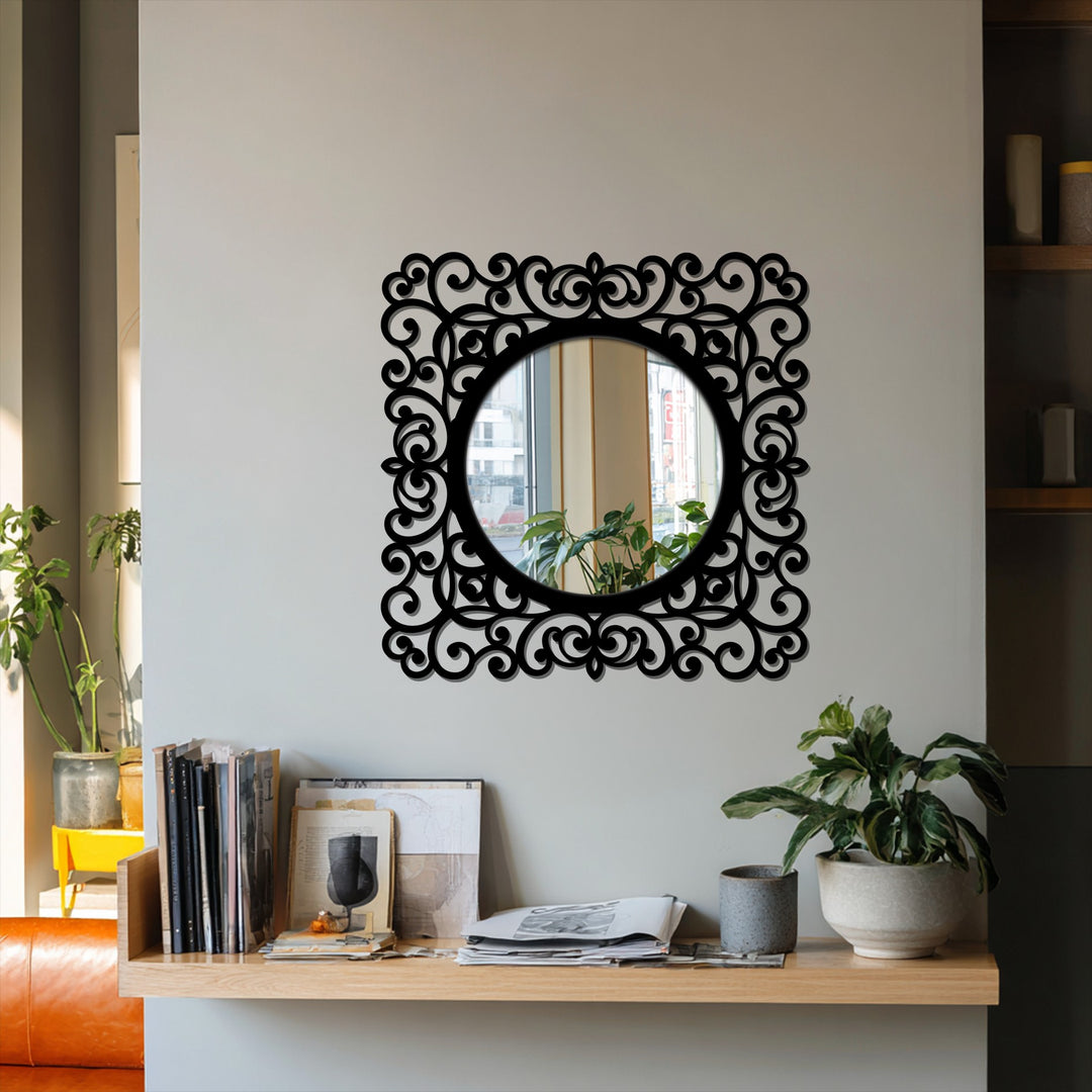 Black baroque scroll frame offers a striking color contrast against the light wall in this modern mirror.