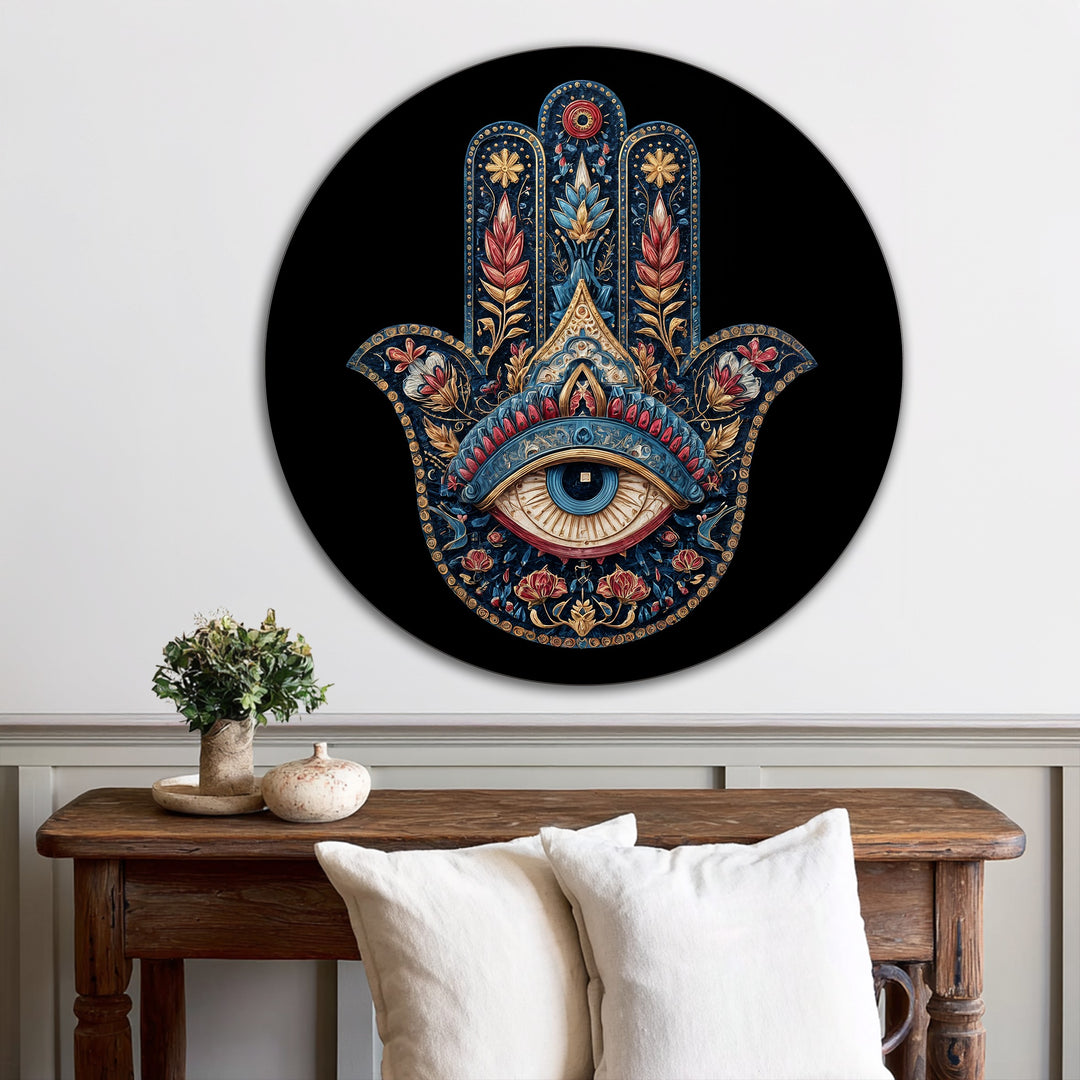 Highlighting the edge of this round oil painting wall art featuring an ornate Hamsa hand with a protective eye, the black border elegantly frames the design.