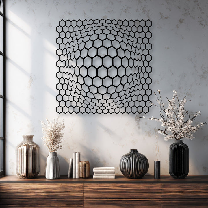 With balanced color saturation, this modern metal wall decor features a bold geometric hexagon depth illusion against a light textured wall.