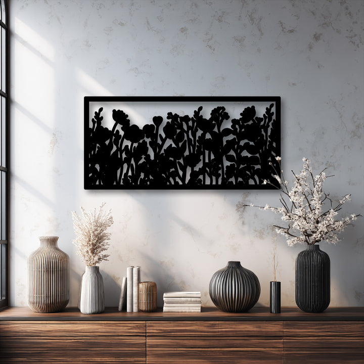 A defined edge with a sleek black border frames the intricate wildflower silhouette metal art for wall.