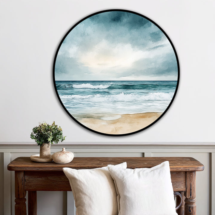 Swirling clouds and crashing waves give a dynamic sense of movement in this round coastal horizon scene, a piece of modern oil painting art on a tranquil beach.