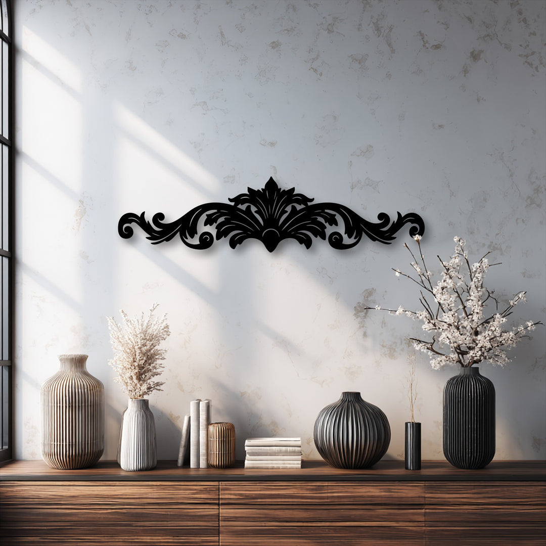 The visual rhythm of the elegant ornamental scroll metal artwork unifies the dark design with the ribbed textures of the vases on the wooden console.