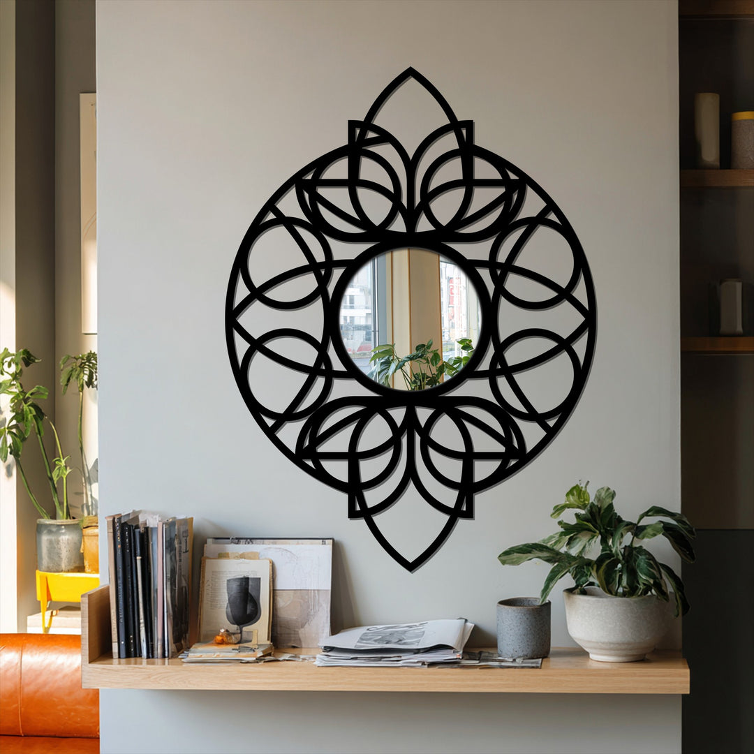 Negative decorative metal art showcases the black circular mandala floor mirror, where the wall color creates a contrasting negative space within the geometric design.