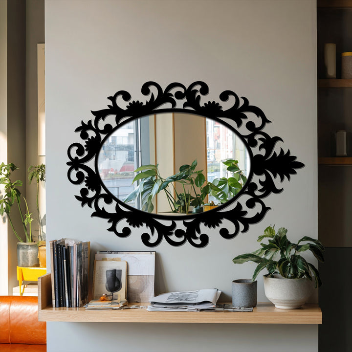 Calm, vintage vibes emanate from this elegant, dark-framed wall mirror, adding a touch of subtle drama to a neutral space.