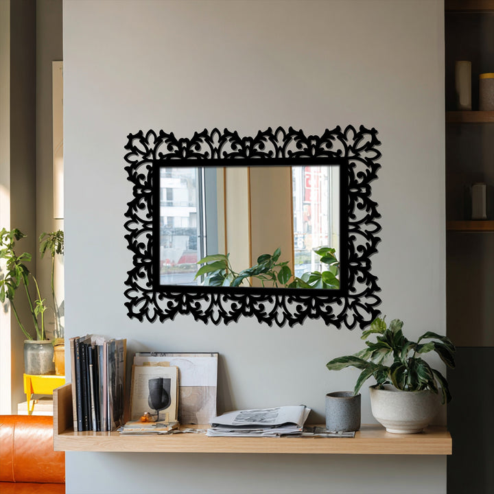 Layering reflections create an artistic depth within this botanical scroll rectangular mirror, where the ornate frame enhances the metal art for wall effect.