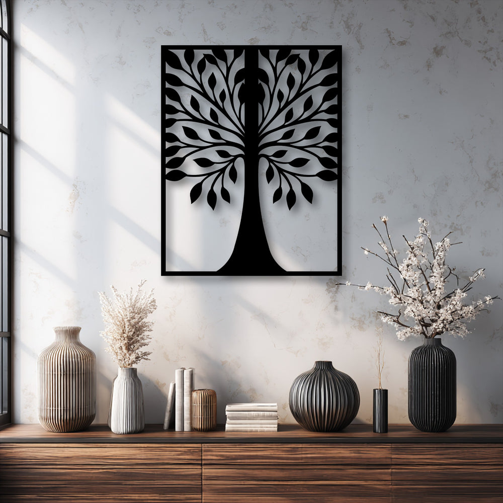 Sleek black borders perfectly frame this symmetrical leaf tree silhouette metal art for wall, casting a sharp contrast on the textured background.