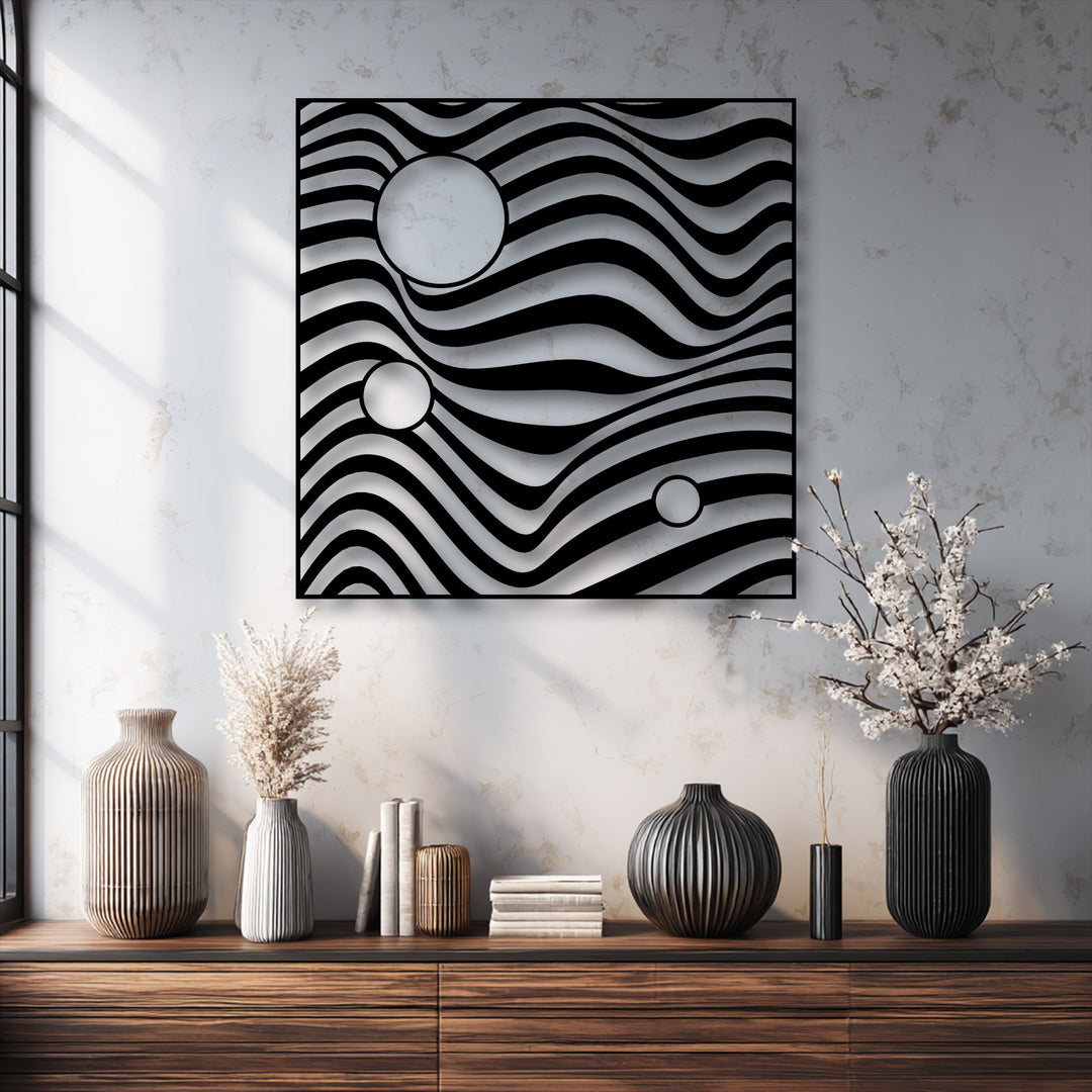 Abstract metal wall decor creating a dynamic optical illusion with flowing wave lines and prominent geometric circles.
