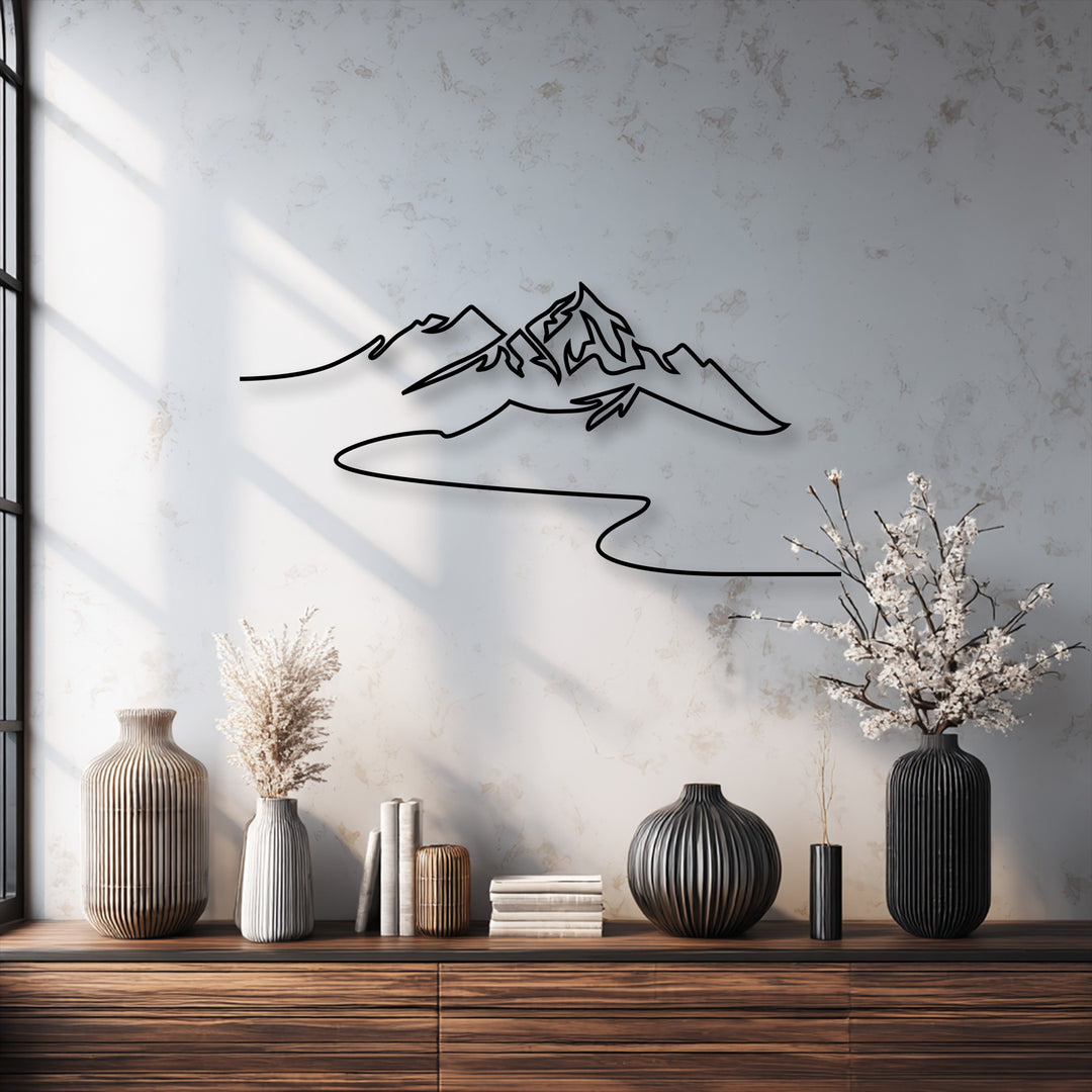 Horizontally oriented metal decoration wall art depicting a minimalist mountain landscape with an abstract continuous line shape.