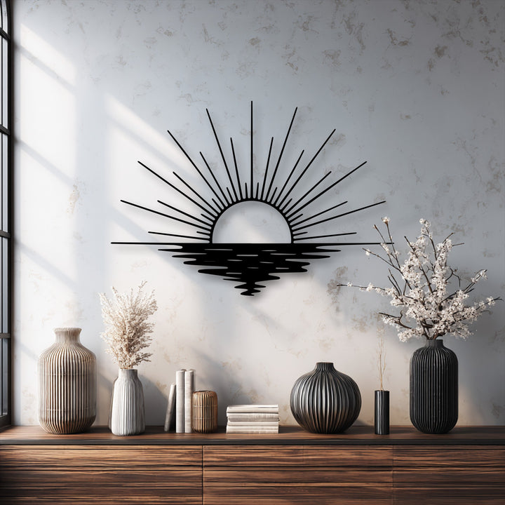 The textured pale wall with subtle, abstract patterns serves as a minimalist backdrop for the stunning decorative metal art.