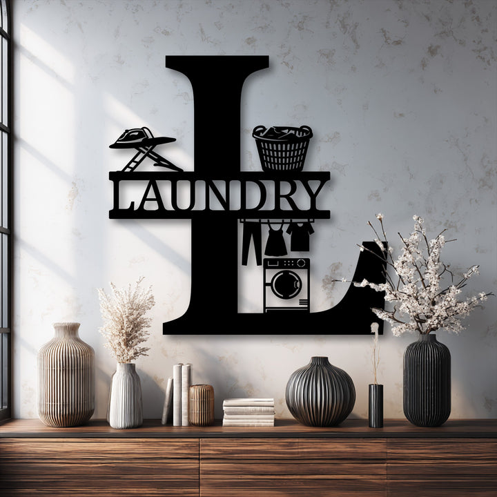 The central subject is a striking black personalized laundry room monogram metal artwork showcasing an L-shaped custom initial with laundry icons.
