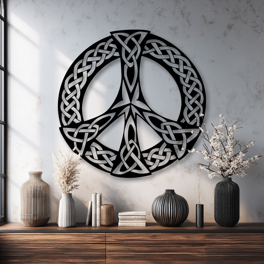 The foreground presents a wooden dresser holding fluted vases, books, and dried florals, providing a warm base for the stunning metal art for wall.