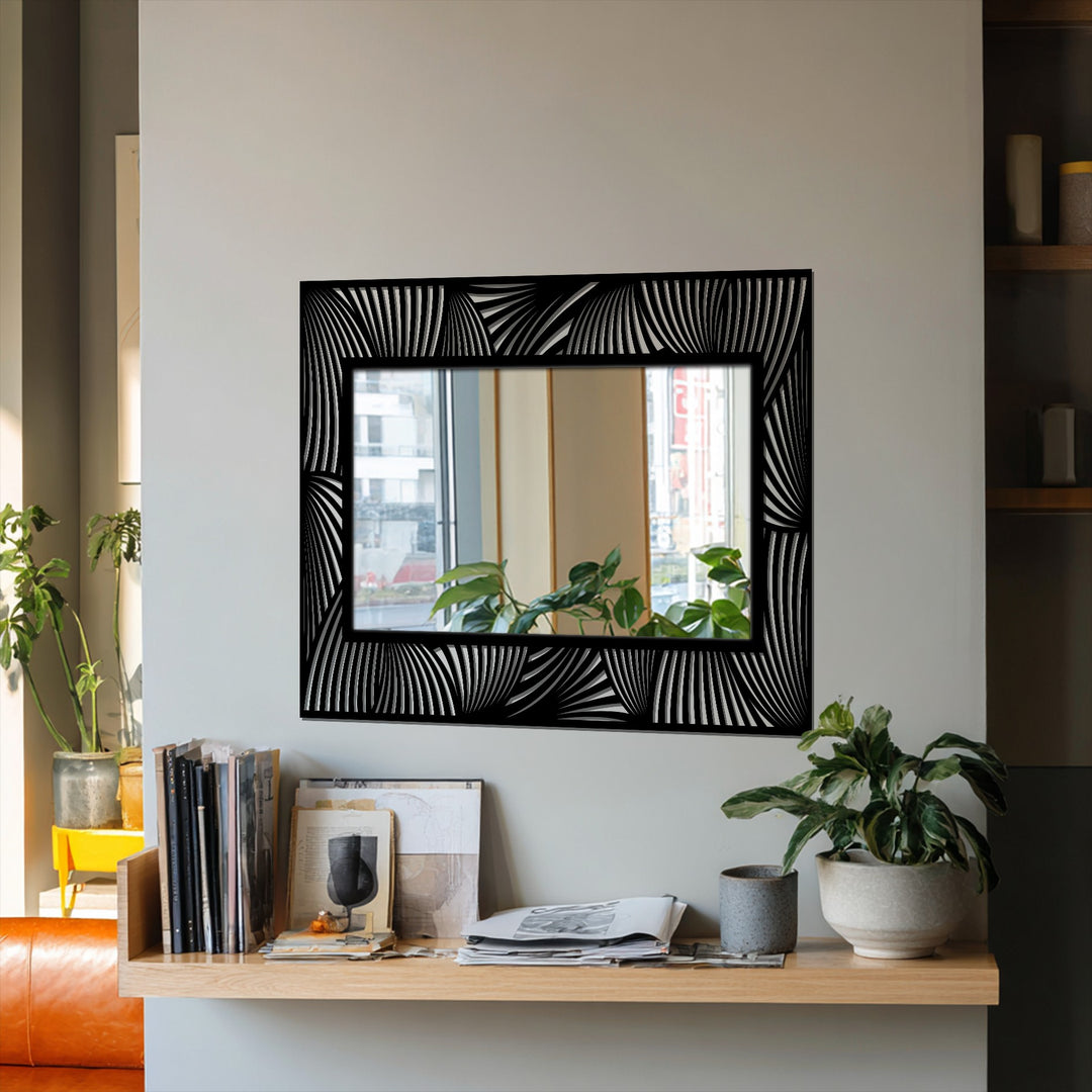 The realistic detail of the abstract wave pattern frame in this modern black decorative mirror shows the intricate textures and reflective surface, enhancing its visual appeal.