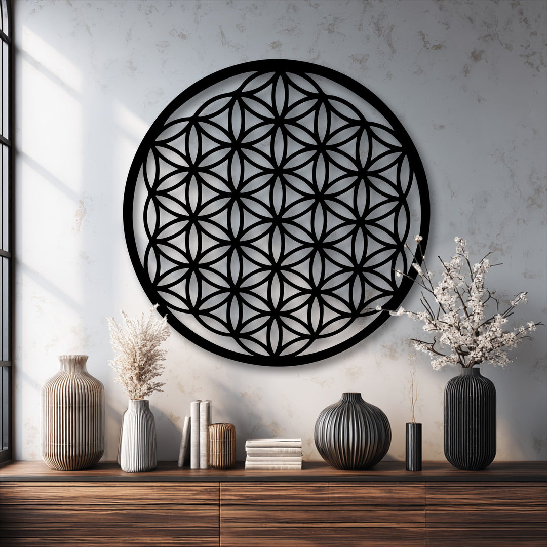 Negative space cleverly defines the intricate sacred geometry of this Flower of Life metal art for wall, creating a captivating design.