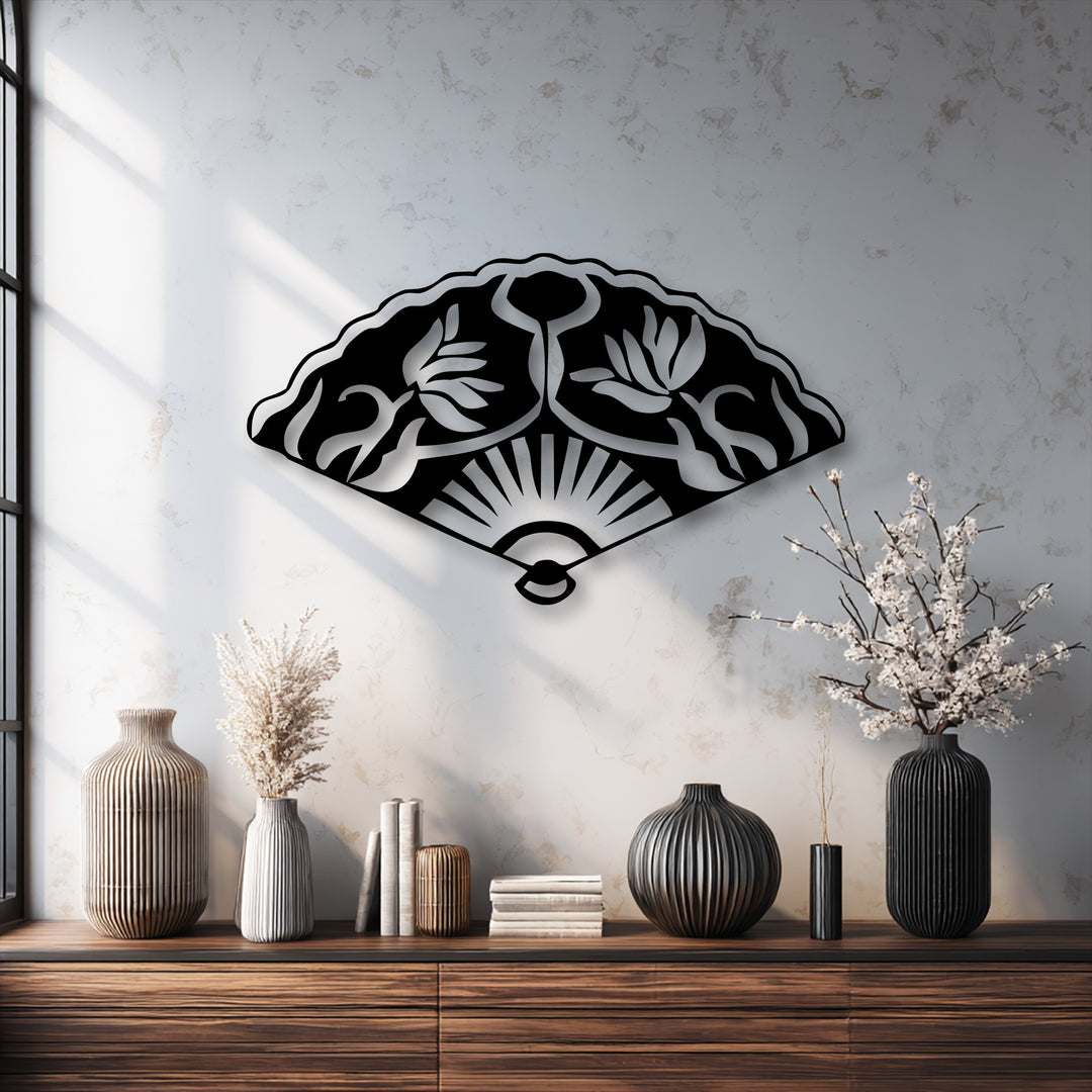 The stillness of the room is accentuated by the elegant Oriental folding fan metal wall decor featuring intricate floral motifs.