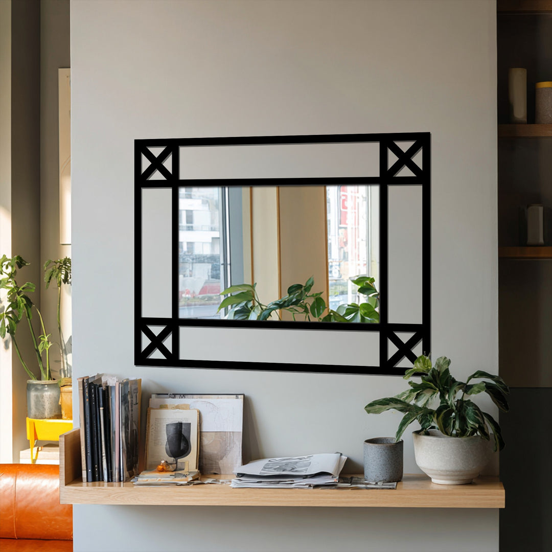 Negative space shapes frame the Minimal Cross Detail Black Metal Floor bathroom mirror, highlighting its clean lines and modern design.