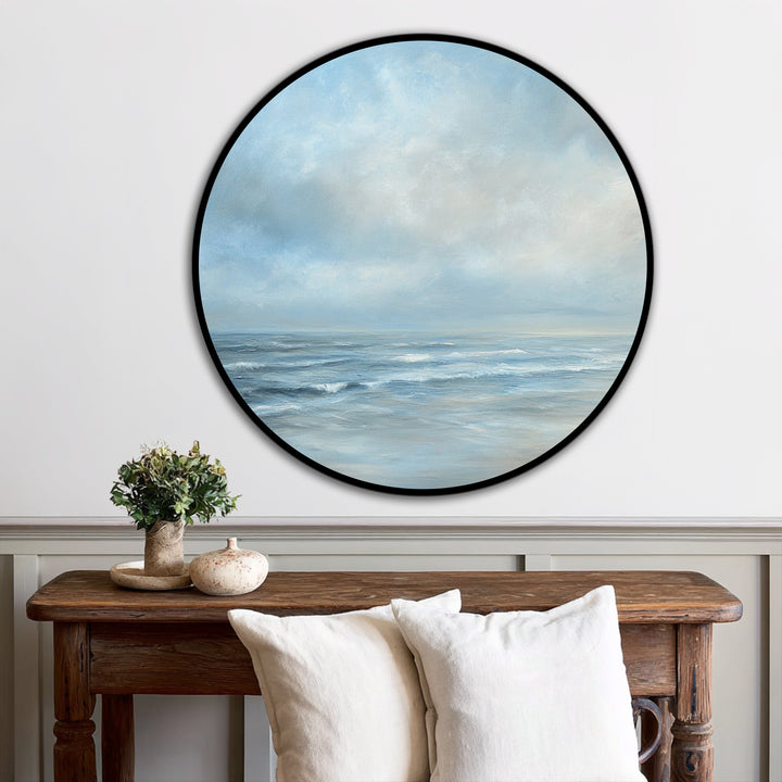 This striking Whispering Tides oil painting wall art showcases a serene seascape with gentle waves under a soft, cloudy sky, captivating the focal point.