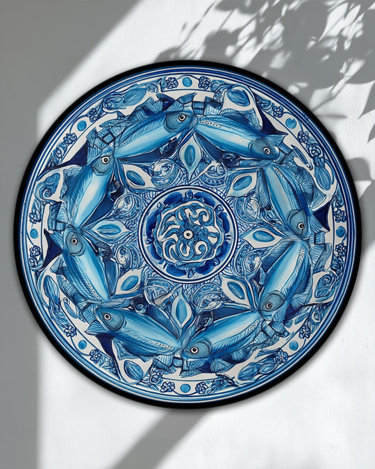 Center mandala surrounded by swimming fish makes this coastal decorative canvas art a vibrant example of canvas art.