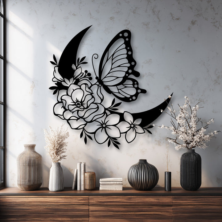 The crisp, clean edges of the butterfly and floral crescent metal artwork showcase its intricate laser-cut design.