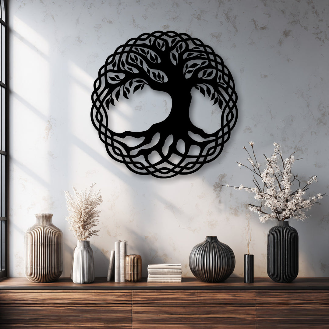 The intricate interwoven edges and circular borders of the black Celtic Tree of Life metal wall decor frame the symbolic nature art.