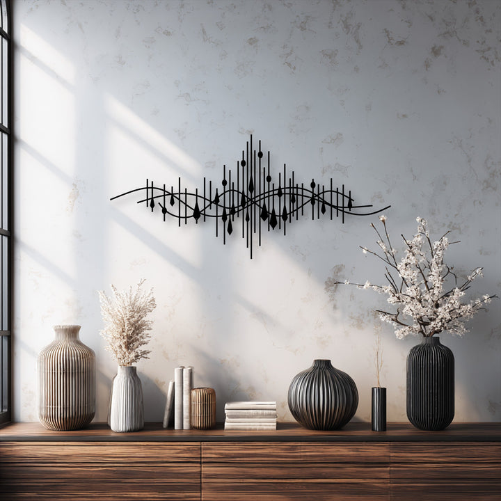 The abstract quality of this unique metal wall art captures a dynamic soundwave design with intricate lines and geometric shapes.
