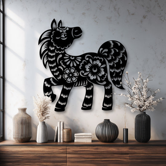 Focusing on the transition between colors, a dark floral pony metal wall decor silhouette starkly contrasts with the light, textured wall.