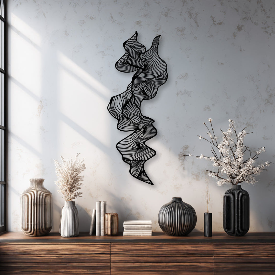 Crafted with durable and high-quality metal, this abstract flow metal wall decor creates a modern line sculpture.
