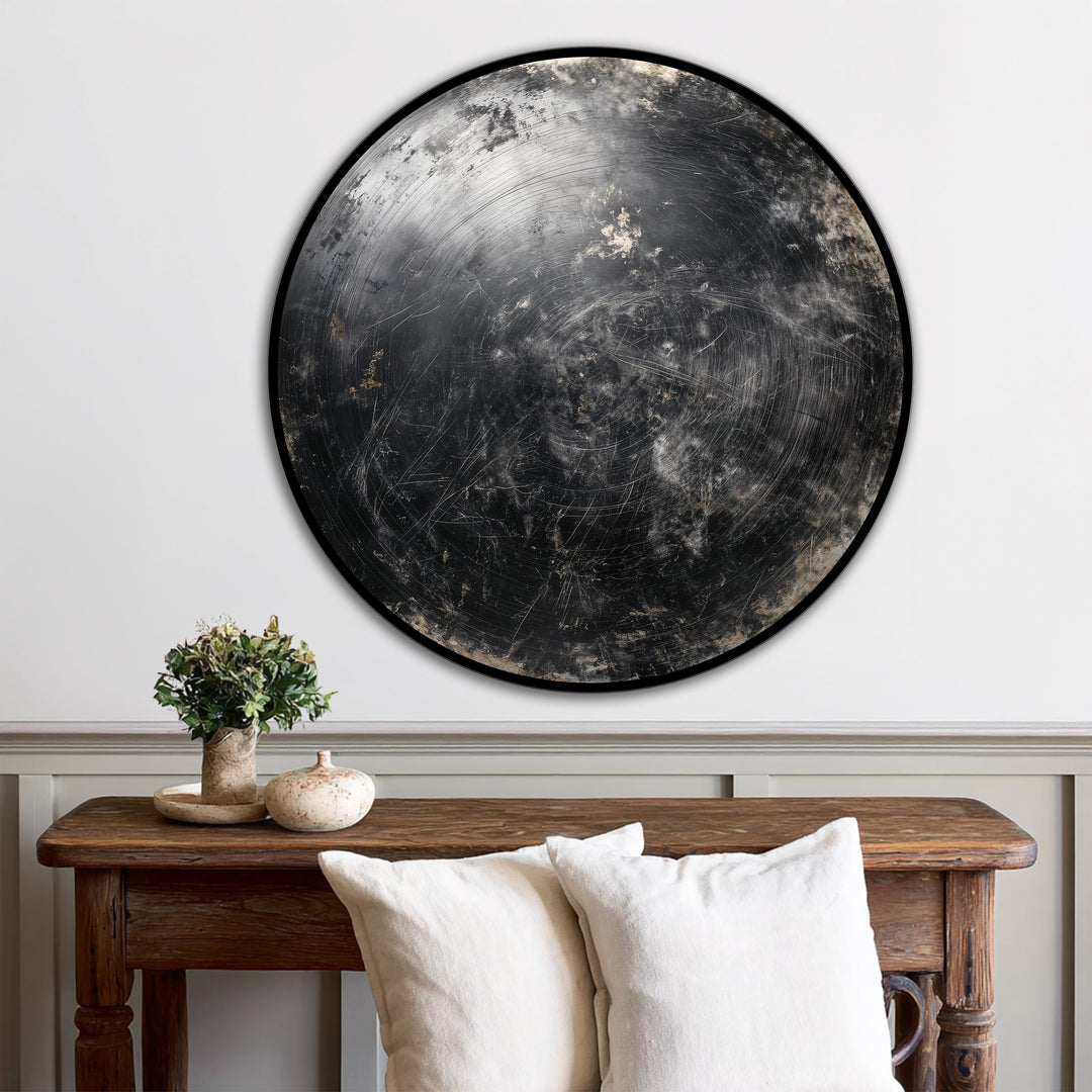 Moody, dark metallic tones create a dramatic oil painting home decor accent in this abstract round wooden 'Midnight Orbit' wall art.